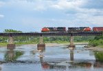 8920 leads CN 402 at Rimouski River